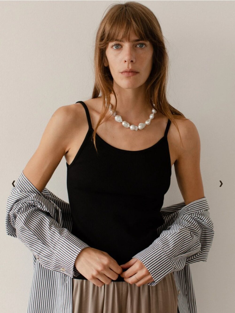 DONNI. Black Slim Ribbed Tank Top